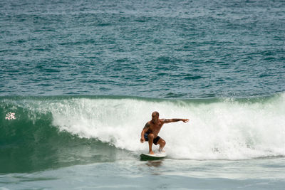 Man surfing in sea