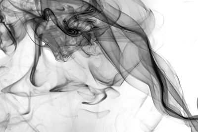 Close-up of smoke against white background