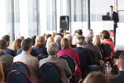 Rear view of people in seminar