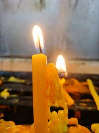 Close-up of burning candle