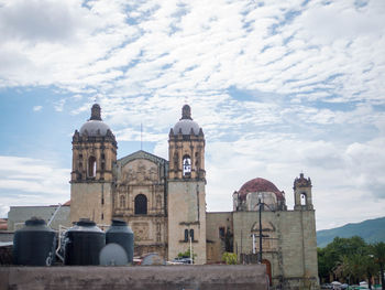 View of historic building against cloudy sky