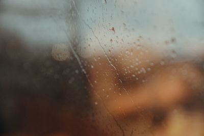 Full frame shot of wet glass window