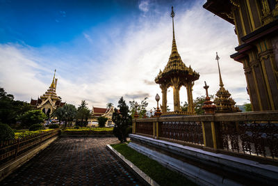 Panoramic view of temple and building against sky