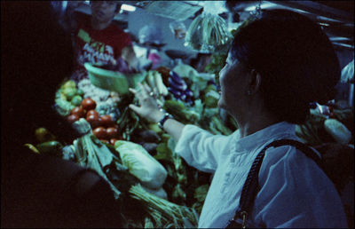 Rear view of woman in aquarium