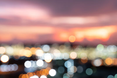 Defocused image of illuminated lights at night