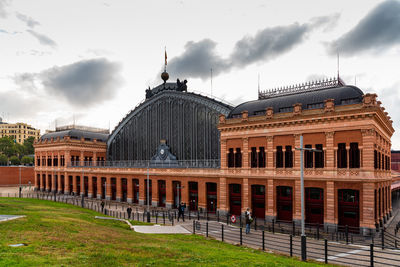 Facade of transportation building against sky