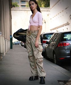 Full length of woman standing in car