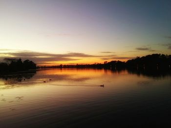 Scenic view of sea at sunset
