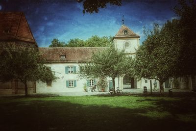 Built structure with lawn in foreground