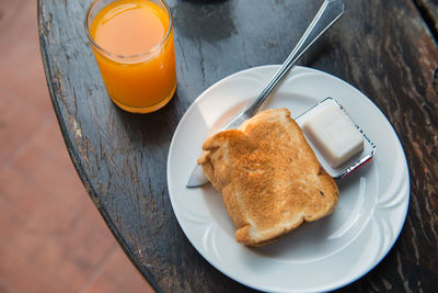 Close-up of breakfast served on table
