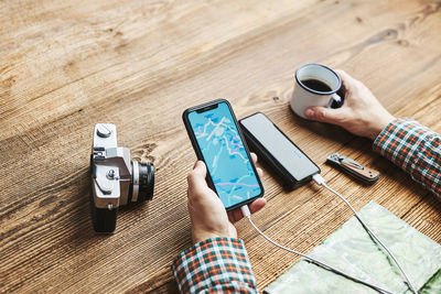 Man planning next vacation trip while journey. searching travel destination using navigation map