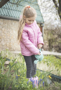 Cute girl with pink flowers