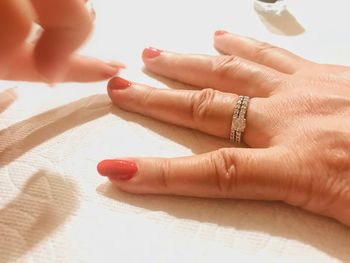 Close-up of woman with hands