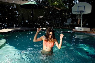 Young woman in swimming pool