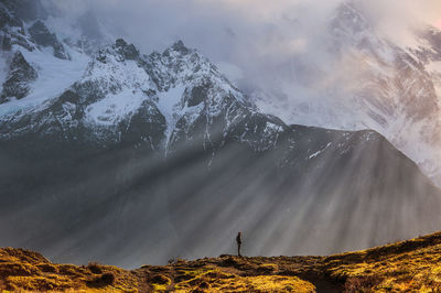 Scenic view of mountains against sky during winter