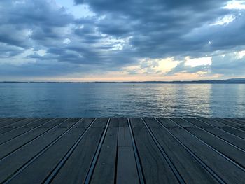 Pier over sea against sky