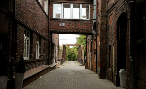 Narrow alley along buildings