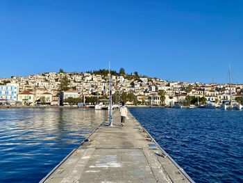 Scenic view of sea against clear blue sky