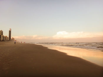 View of beach against sky during sunset
