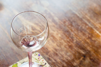 High angle view of wine glass on table