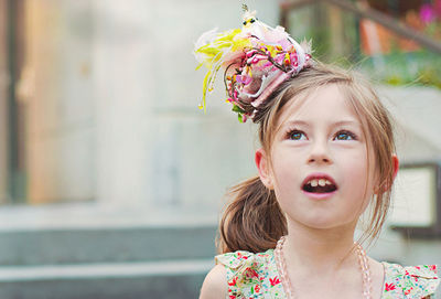 Close-up of cute girl wearing flowers