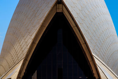 Low angle view of building against blue sky