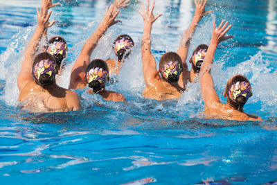 Women swimming in pool