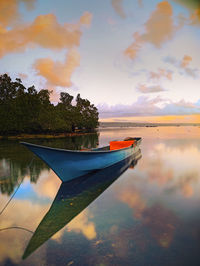 An empty blue boat 