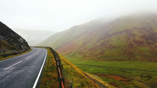 Country road passing through mountains