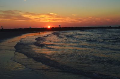 Scenic view of sea at sunset