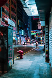 People walking on street in city