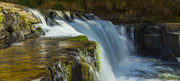 River flowing through rocks