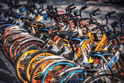 Close-up of bicycles in parking lot