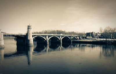 Bridge over river against sky