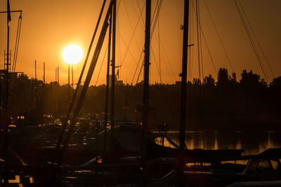 Silhouette of marina at sunset