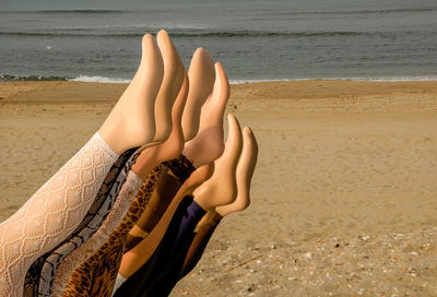 Low section of woman on beach