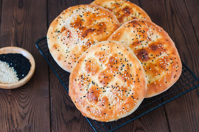 Ramadan pidesi traditional turkish flatbread with nigella or sesame seeds. food for holy ramadan.