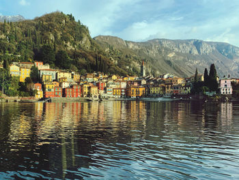 Scenic view of lake and mountains, and a wonderful village, varenna, against sky