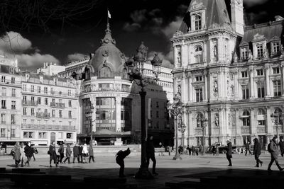 People in front of historical building