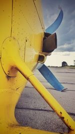 Close-up of yellow airplane