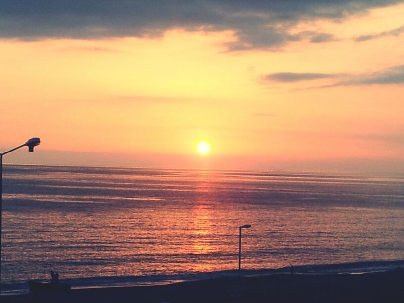 sunset, horizon over water, sea, scenics, sun, beauty in nature, tranquil scene, tranquility, orange color, water, sky, idyllic, silhouette, nature, beach, cloud - sky, shore, remote, reflection, sunlight