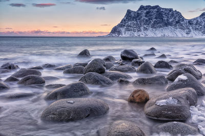 Scenic view of sea against sky during sunset