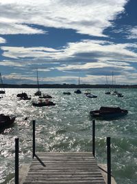 Pier over sea against sky