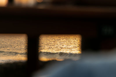 Close-up of illuminated wood at sunset