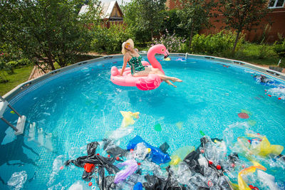 Woman swimming in pool