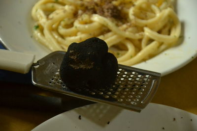 High angle view of pasta in plate on table