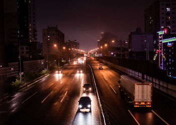 High angle view of city street at night