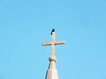 Low angle view of church against clear blue sky