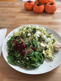 High angle view of vegetables in plate on table