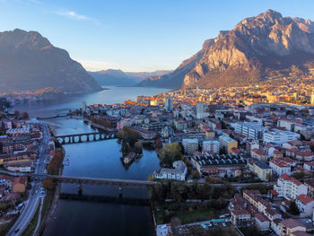 Panoramic view of the city of lecco, its lake and the surrounding mountains